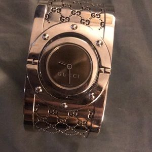 Women’s silver Gucci watch